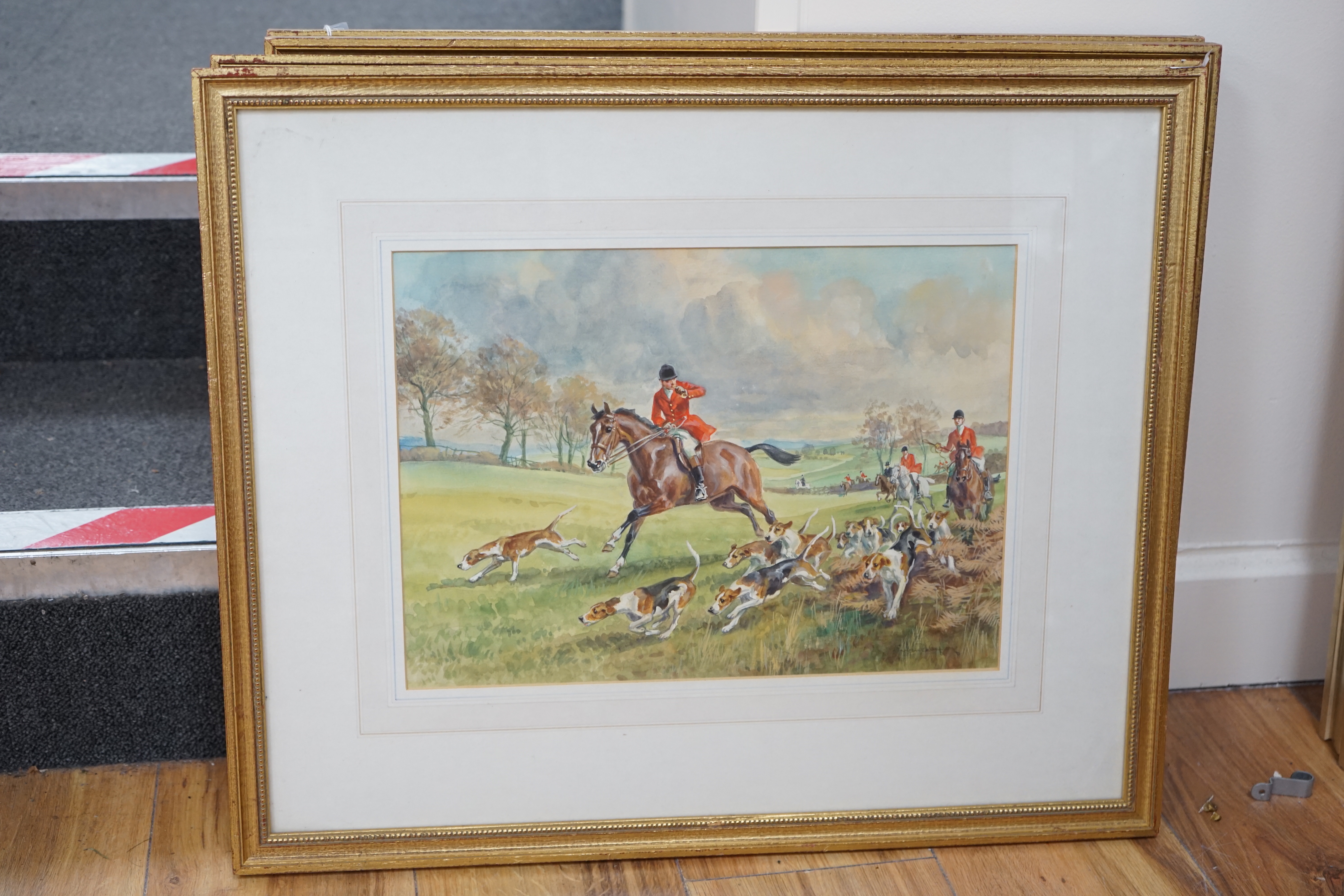 Set of four hunting interest watercolours, Huntsmen on horseback with hounds, each indistinctly signed, 26 x 36cm